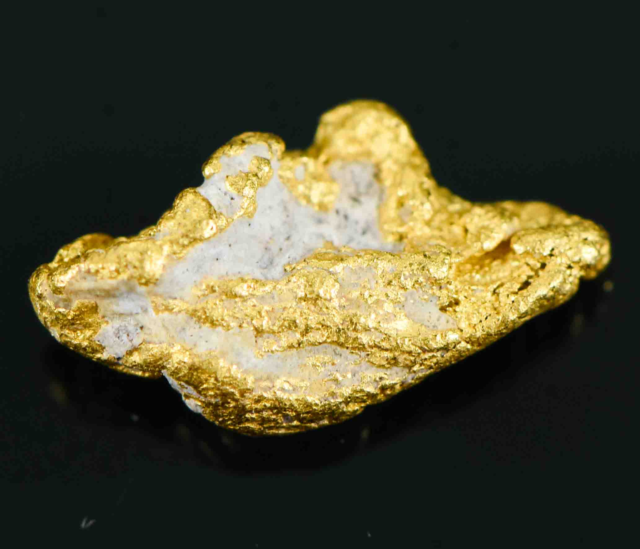 #2 Australian Natural Gold Nugget With Quartz Weighs .79 Grams.